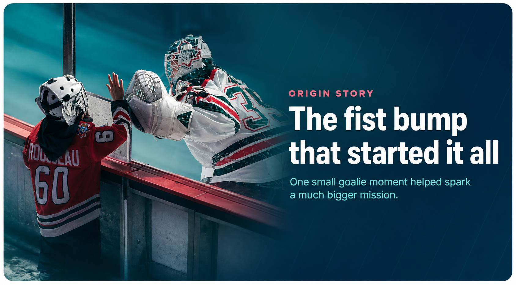 Charlie fist bumping a goalie at the glass, the moment that started Goalie Girl HQ